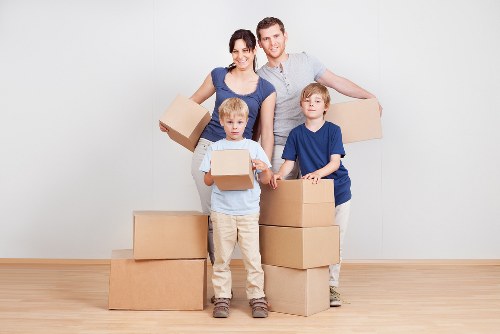 Neatly arranged boxes and belongings in Queenspark Storage